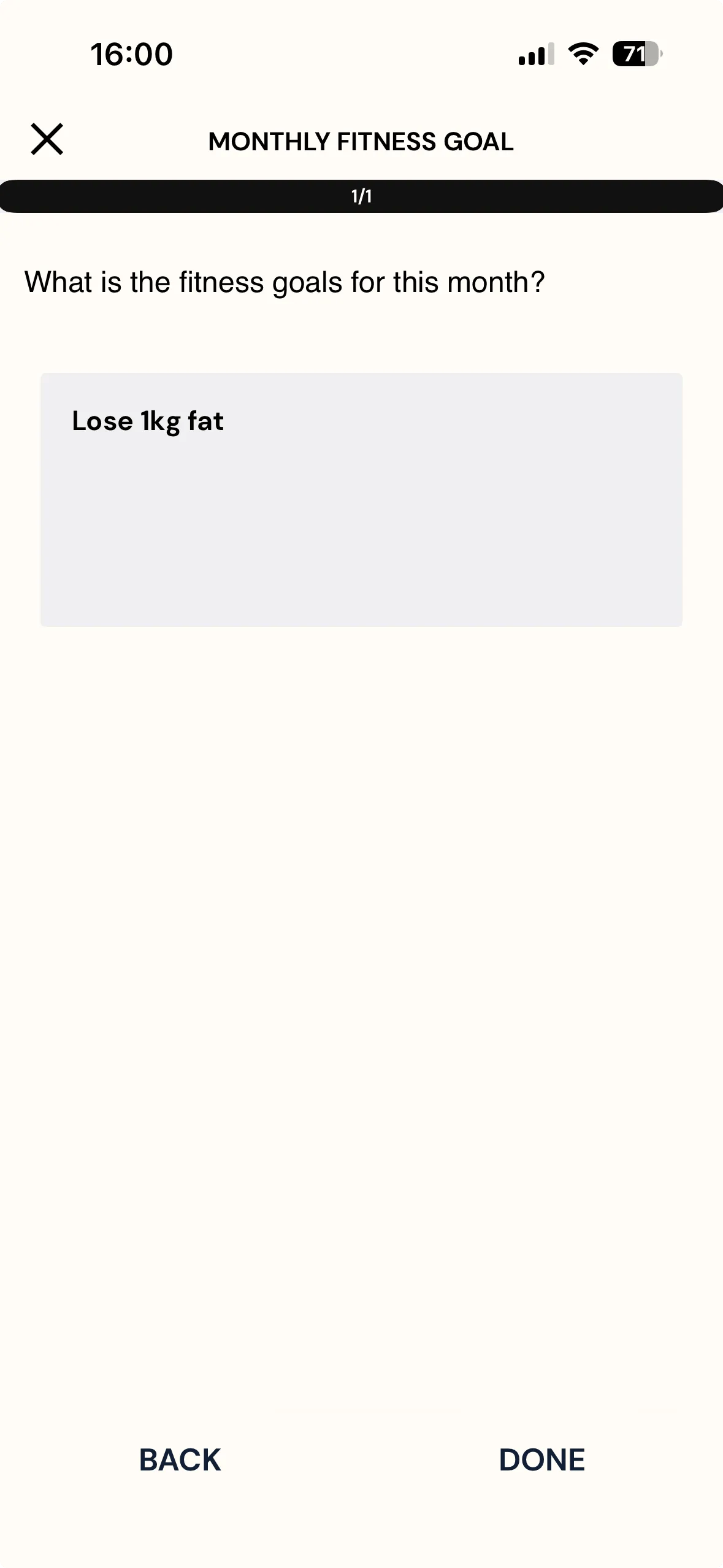 The Monthly Fitness Goal survey on the ExpiWell mobile app showing question 1 of 1, What is the fitness goals for this month?, answered with the text Lose 1kg fat