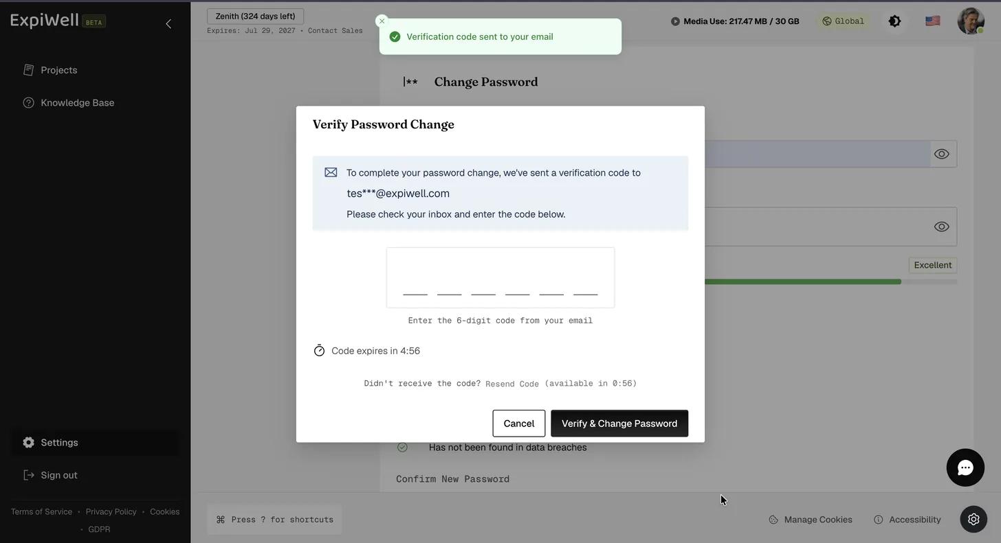 The Verify Password Change dialog naming the masked address the code was sent to, an empty six-digit field, a countdown showing how long the code remains valid, a Resend Code link not yet available, and Cancel and Verify and Change Password buttons