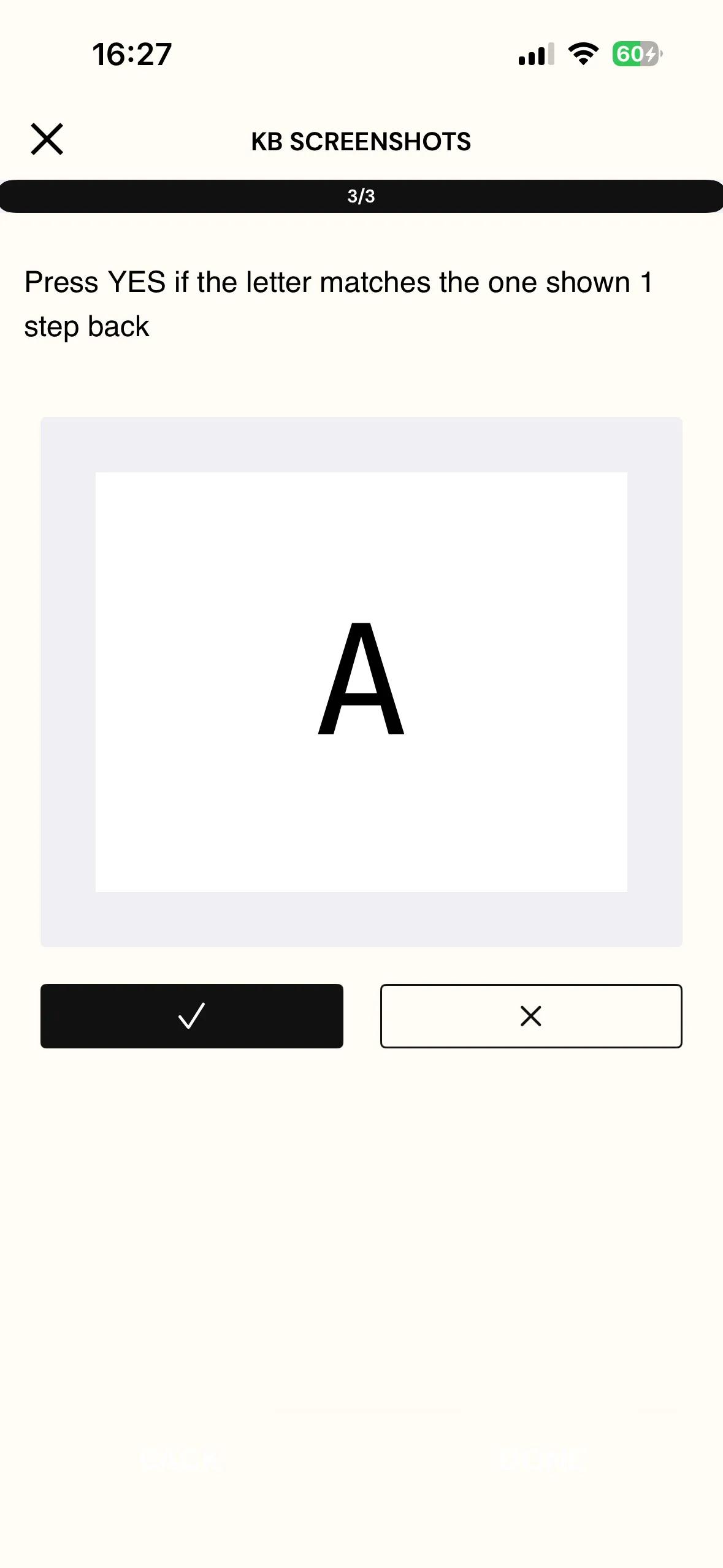 The N-Back task on the mobile app showing the letter A with two response buttons below it, a filled button carrying a checkmark for a match and an outlined button carrying a cross for no match