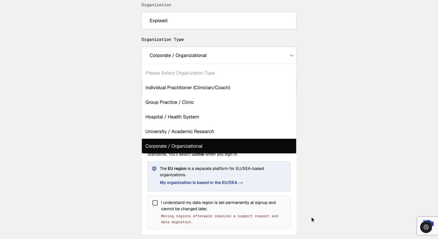 The Organization Type dropdown open on the sign-up form listing its five options, above the account-region panel and a checkbox acknowledging that the data region is permanent