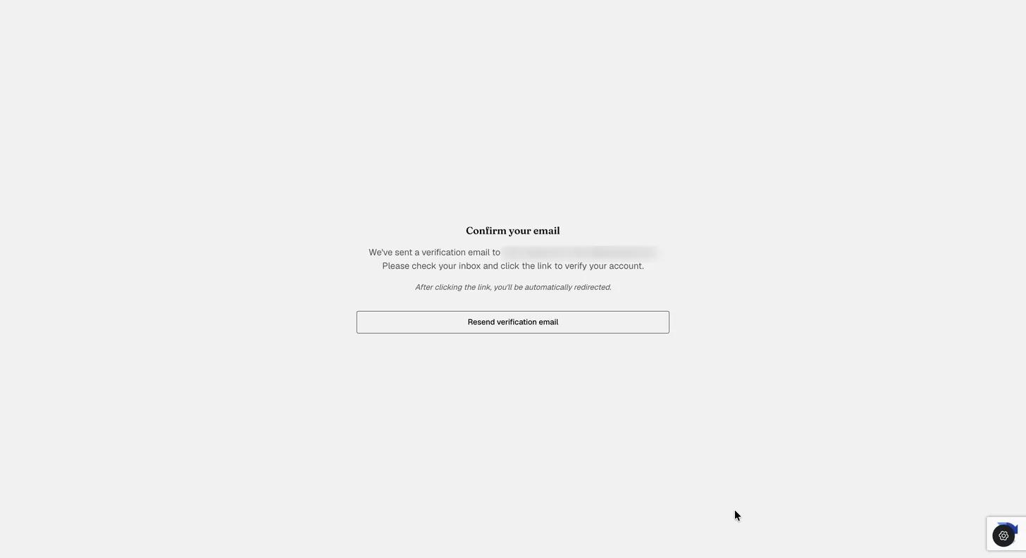 The Confirm your email screen explaining that a verification link has been sent and that clicking it redirects you automatically, with a Resend verification email button