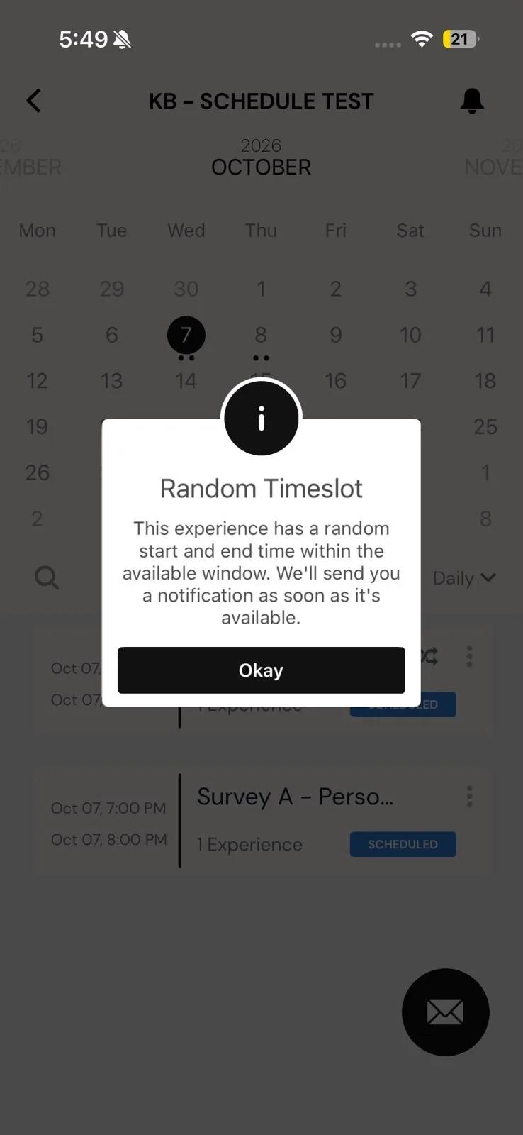 The Random Timeslot popup on iOS explaining that the experience has a random start and end time within the available window and that a notification will be sent as soon as it's available, with an Okay button