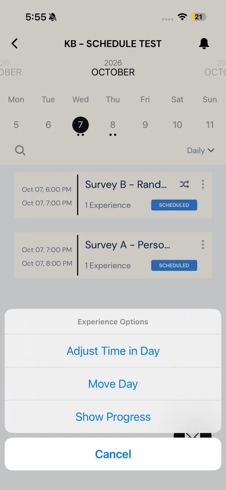The Daily view of a study on iOS with two scheduled surveys, and the Experience Options menu open over it offering Adjust Time in Day, Move Day and Show Progress