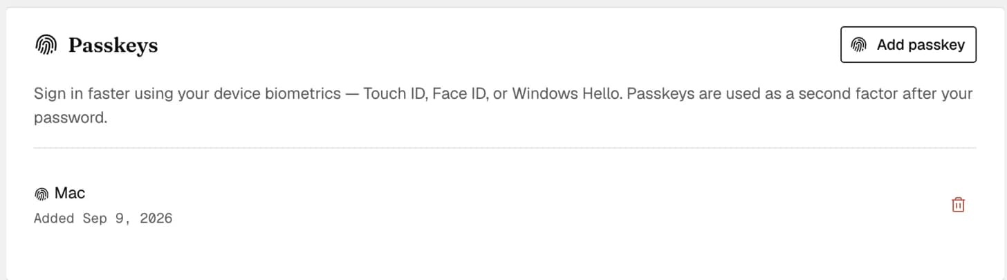 The Passkeys card after registration, listing a passkey named Mac with the date it was added and a control to remove it, beside the Add passkey button