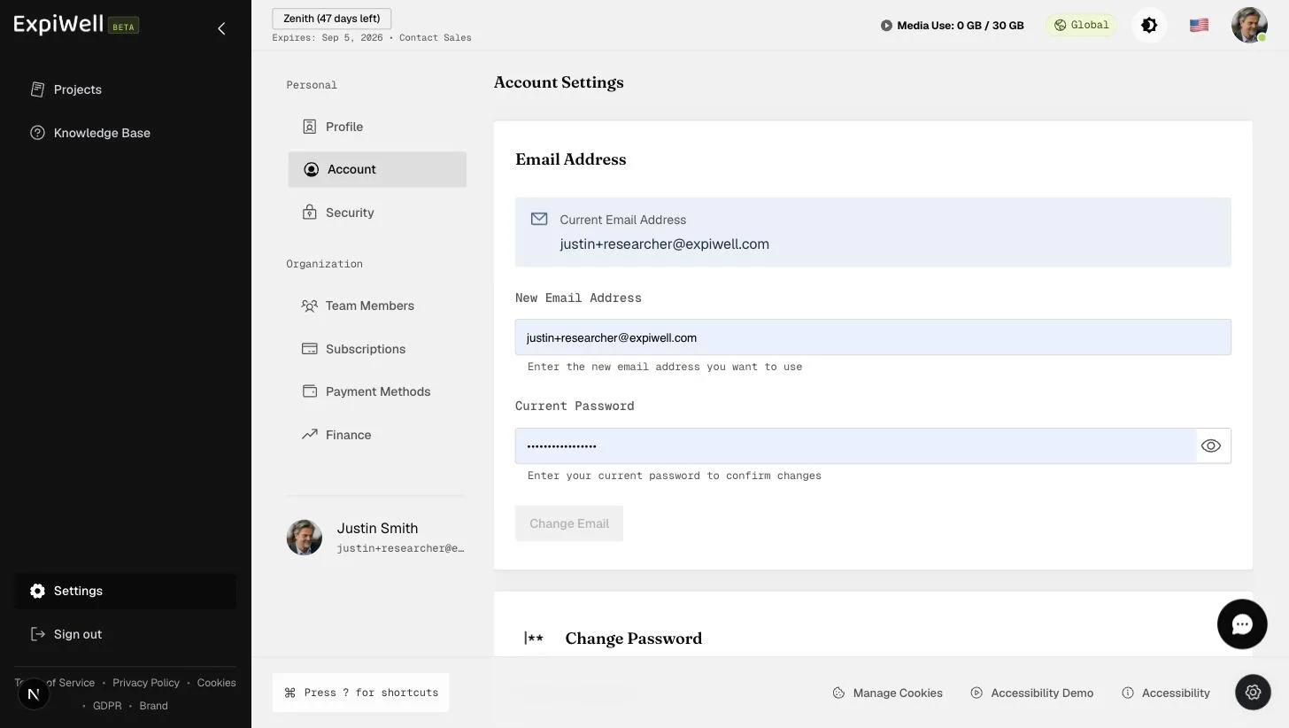 The Account Settings page showing the current email address, a new-email field, and a current-password confirmation before the Change Email button